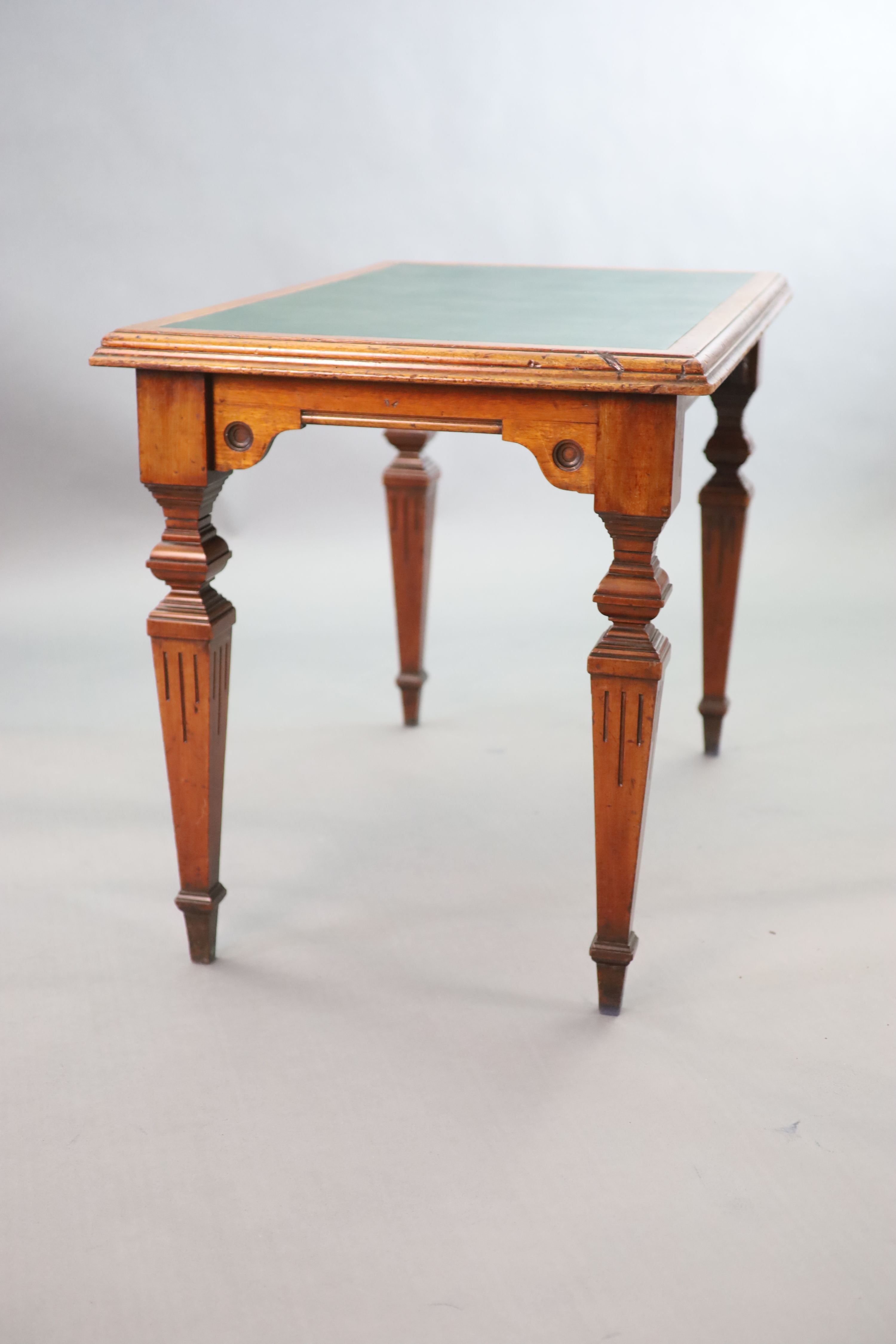 A Victorian mahogany library table, supplied by Sage & Co. Shopfitters of London, W.113cm D.69cm H.78cm